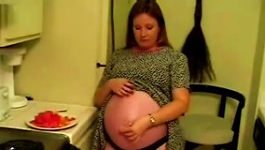 Solo Scene With Horny Pregnant Slut Rubbing Her Vagina