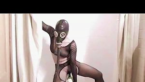 Girl In A Gas Mask Having Fun With Piss