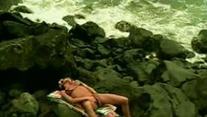 Hawaiian Girl On The Rocks