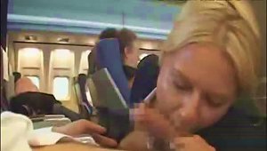 Sexy Stew Sucking And Stroking Dick On Plane