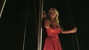 Blonde With Natural Tits In Miniskirt Strips Outdoor