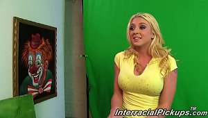 Blonde Hoists Her Yellow Blouse Backstage To Show Her Tits