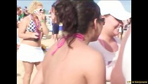 Lecherous Party Girls Show Off Their Goods In A Spicy Beach Party